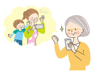 スマホで通話するシニア女性と娘と孫