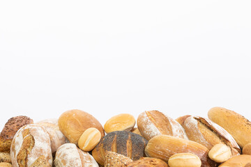 Many kinds and kinds of bread collected in one place as decoration for a traditional bakery. White background from the top for self-completion.