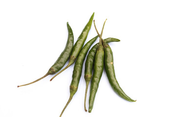 Green chillies on white background