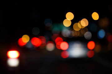 Abstract defocused bokeh lights background. Night city street