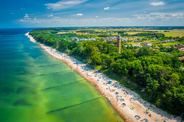 People at the summer beach by Baltic Sea, aerial view
