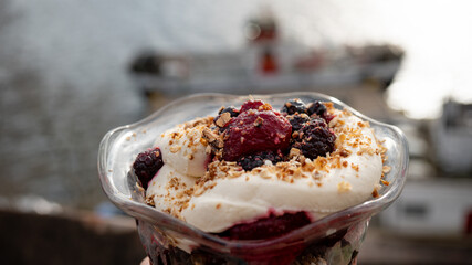 Cranachan in a bowl with sunny Seaview background 