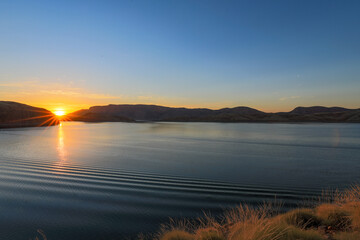 Scenic view of Lake Argyle beneath blue sky