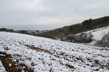 Snowy fields and arable lands during winter