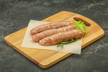 Raw pork meat sausages for grill