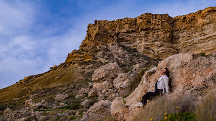 Young woman resting in the mountains