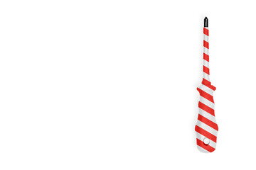 Obraz premium Metal screwdriver with a striped rubberized handle. Background on the theme of tools, service, repair. 