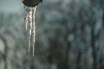 icicles hanging from a roof