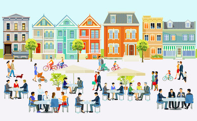 Obraz na płótnie Canvas Großer Platz mit Menschen die im freihen vor einem Restaurants und Cafes sitzen
