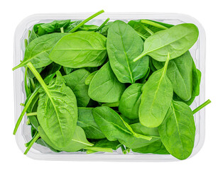 Spinach leaves  in a plastic package isolated on white background. Green Spinach leaves box Top...