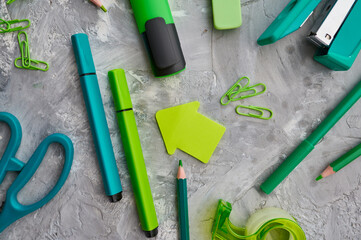 Office stationery supplies in green tones