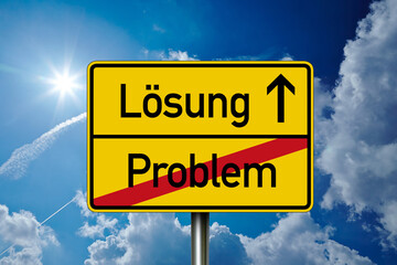 Road sign with the german translation for problem and solution - problem und lösung with blue sky background