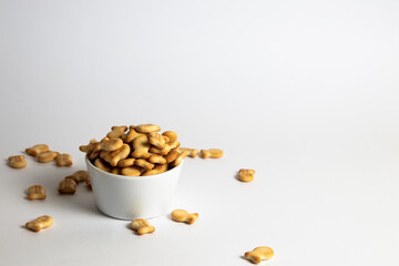 Fish-shaped crackers in a white bowl