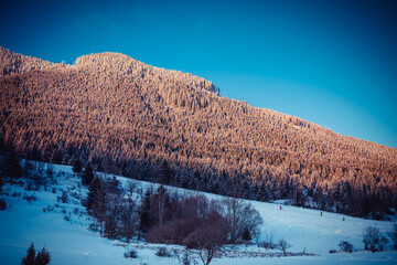 Snow covered landscape on cold and sunny day.Winter image.