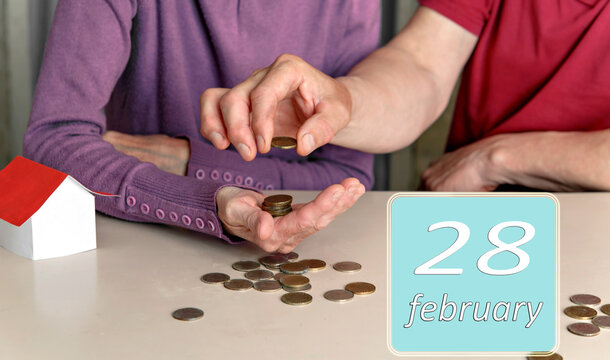 February 28, 28th day of month. Reminder to plan family budget together for woman and man. Winter month .Day of the year concept.