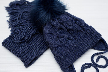 Winter children's knitted hat and scarf in blue