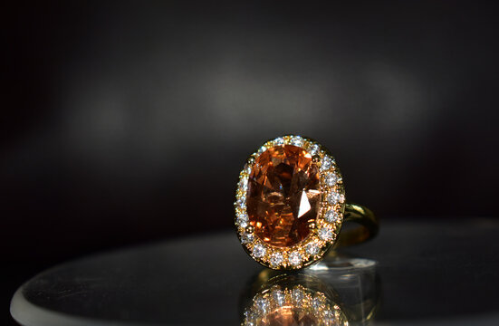 Gold Ring Decorated With Yellow Gemstone