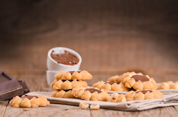 Flower shaped chocolate biscuits.