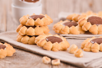 Flower shaped chocolate biscuits.