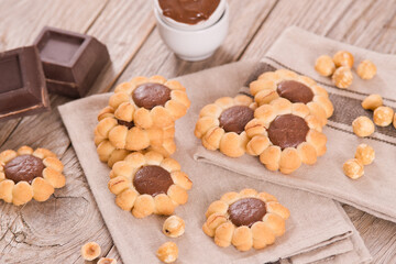 Flower shaped chocolate biscuits.