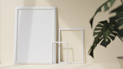 Mock up white photo frame and green leaf on wall and floor warm color. ,3d model and illustration.