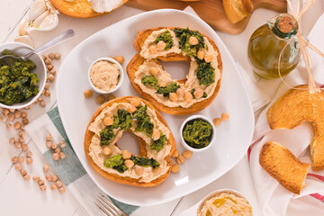 Friselle with turnip tops and hummus. 