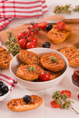 Toasted bread with tomato and oregano. 
