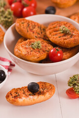 Toasted bread with tomato and oregano. 