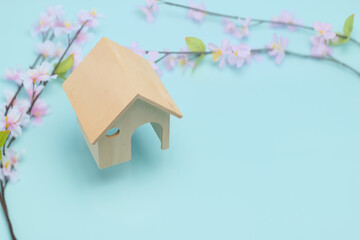 桜と住宅模型　新生活イメージ