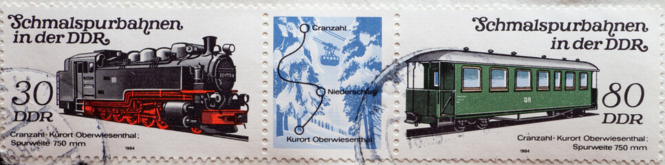 GERMANY, DDR - CIRCA 1984 : a postage stamp from Germany, GDR showing two narrow-gauge railways in...