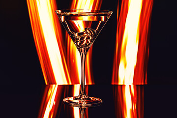 glass of champagne on fiery background - 411493839