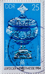 GERMANY, DDR - CIRCA 1984 : a postage stamp from Germany, GDR showing an artfully cut lead crystal...