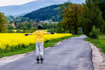 Young boy rollerblading outdoor