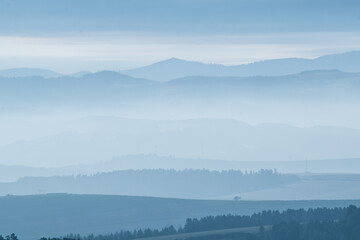 Fototapeta na wymiar Landscape with mountains with fog