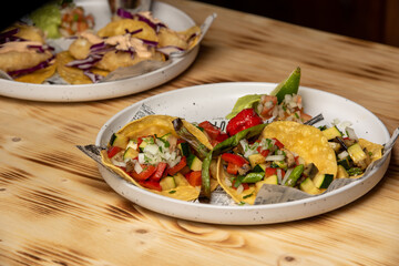 Vegetarian Mexican tacos on white plate