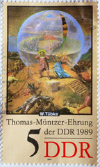 GERMANY, DDR - CIRCA 1989 : a postage stamp from Germany, GDR showing a painting for the birthday of the theologian, reformer, printer and revolutionary Thomas Müntzer. Annunciation by angels