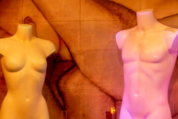 male and female mannequin in shop window