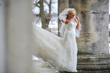Fototapeta na wymiar Beautiful bride outdoors on winter day