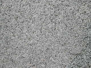 Rough texture of granular stone. Hard coating.