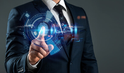 The man gains access to the personal information of the holograms with fingerprint identification. Modern technologies, cloud data storage.