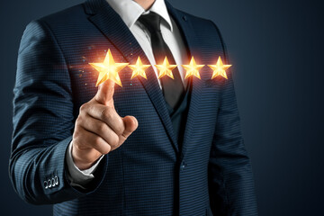 A man in a business suit gives a five stars rating. Rating increase concept, classification....