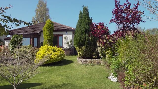 Front garden and lawn of a bungalow in England