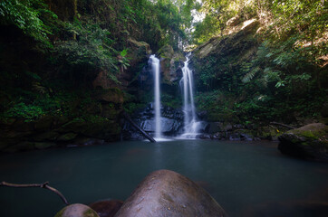 water fall in deep forest on the mountain in Thailand is paradise very beautiful natural landscape background.