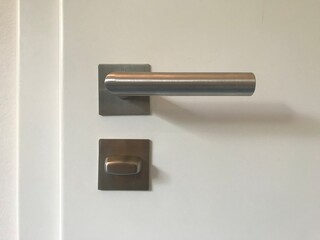 Doof handle on a white door