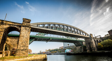 The Wearmouth bridge and the Monkwearmouth rail bridges sit side by side across the river Wear, Sunderland