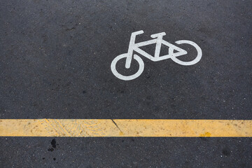Image of Bicycle sign or icon on the road in the park. Bike path