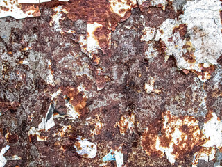 Naklejka premium Rusty surface with burnt-out paper particles. Texture for retro poster and filters.