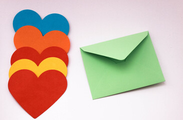 heart shaped paper colorful for love messages background.