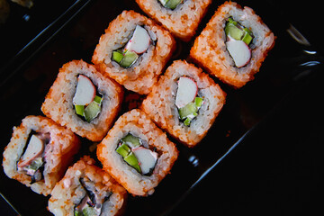 Set of Japanese sushi roll on dark background