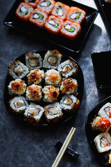 Set of Japanese sushi roll on dark background